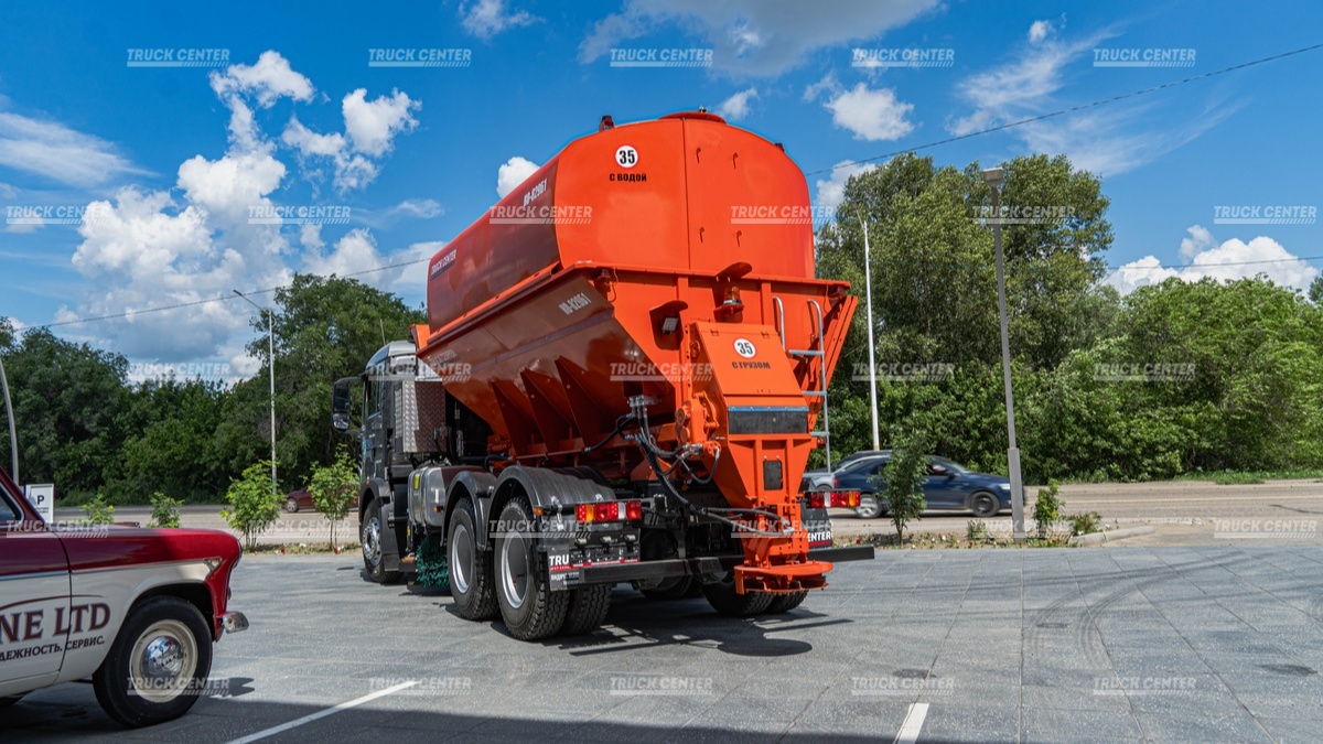 Комбинированная дорожная машина КО-829Б1 на шасси HOWO T5G 6x4
